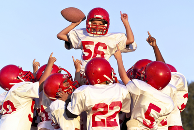 Building Leadership Skills in Young Athletes Through Little League Football